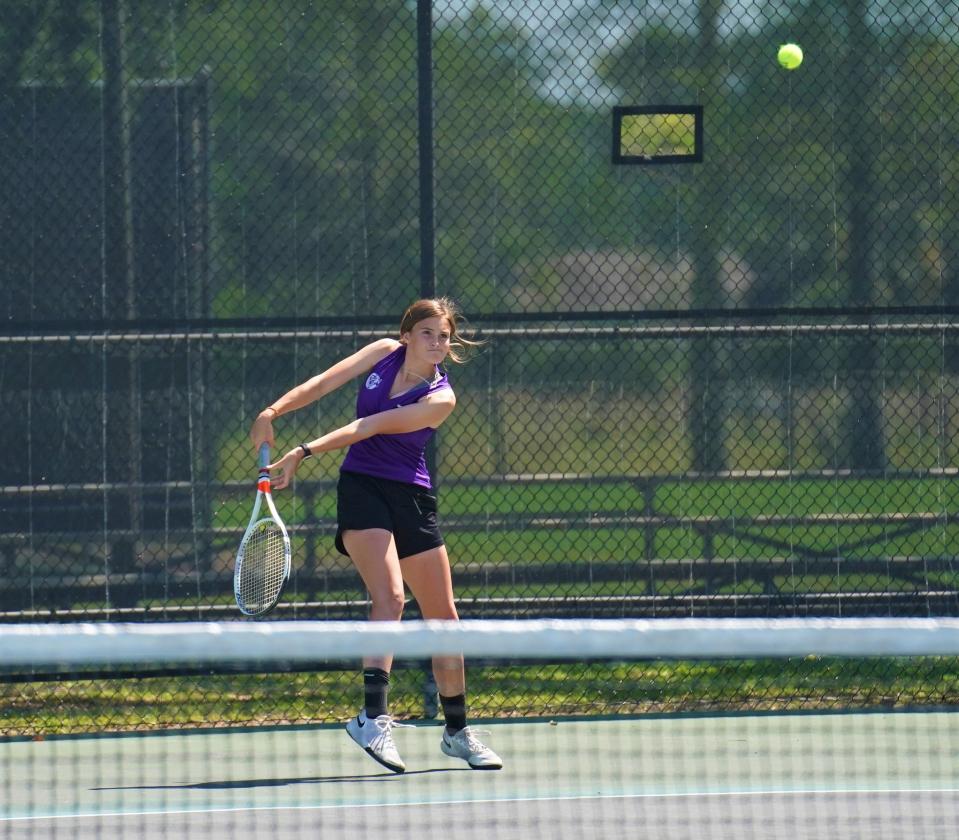 Okeechobee's Isabella Derigo hits a return during a 3A regional quarterfinal tennis match against Lake Buena Vista on Tuesday, April 18, 2023 in Okeechobee.