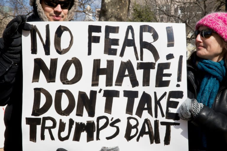 Demonstrators gather near the White House to protest President Donald Trump's travel ban on six Muslim countries on March 11, 2017