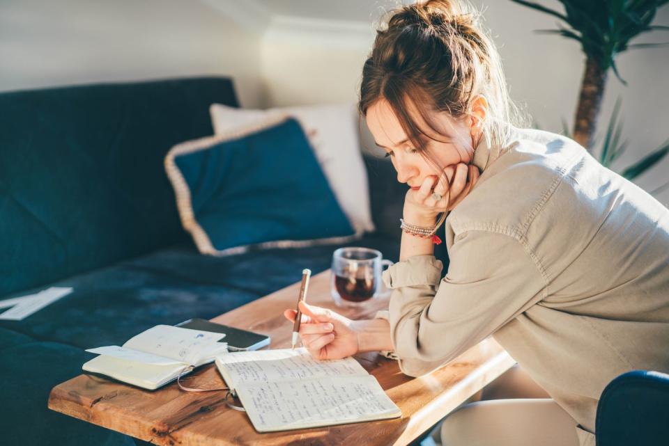 woman working online on laptop at home