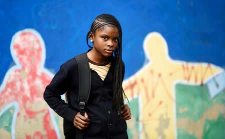 Aja Johnson, 11, who's mother, Lakesha Johnson, is a homeless health care aide, poses for a photo in Philadelphia, Pennsylvania, U.S. April 26, 2017. REUTERS/Mark Makela