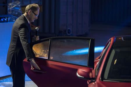 Johan De Nysschen, president of Infiniti Motor Company, attends an event announcing the new Q50 sports sedan in Hong Kong May 22, 2014. REUTERS/Tyrone Siu