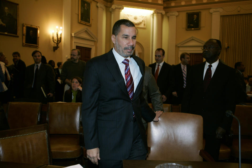 New York Governor David Paterson takes his seat before the U.S. House Ways and Means Committee hearing on economic recovery and job creation options on Capitol Hill in Washington October 29, 2008. Paterson said on Wednesday the U.S. Congress must pass a stimulus bill that includes "direct and immediate fiscal relief" for states such as emergency block grants.   REUTERS/Mitch Dumke  (UNITED STATES)