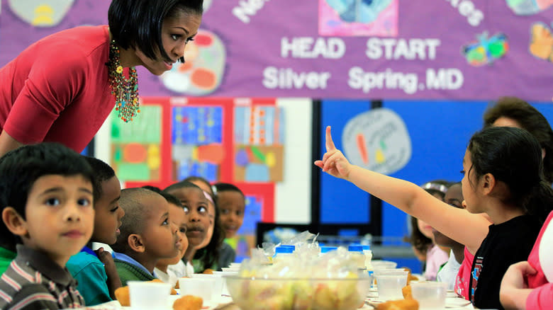 Michelle Obama making school lunches