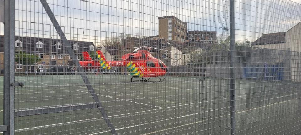 An air ambulance in Surrey Street, Croydon, on Friday (PA/PA Wire)