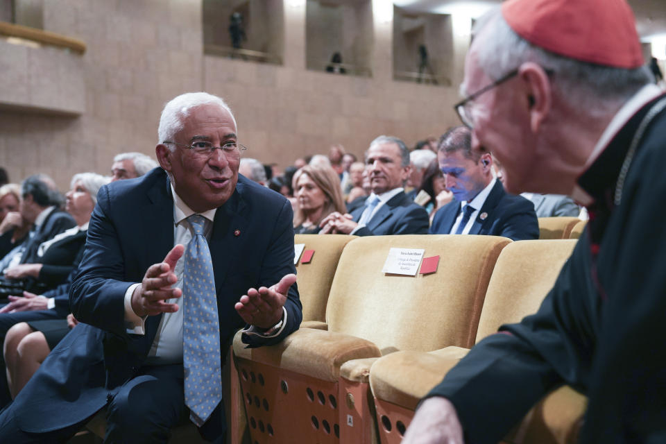 Portugal's Prime Minister Antonio Costa, left, speaks with Cardinal Pietro Parolin, the Vatican Secretary of State before a meeting with the Authorities, Civil Society and the Diplomatic Corps at the Belem Cultural Centre in Lisbon, Wednesday, Aug. 2, 2023. Pope Francis has started his five-day pastoral visit to Portugal that includes his participation at the 37th World Youth Day, and a pilgrimage to the holy shrine of Fatima. (AP Photo/Ana Brigida)