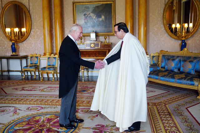 <p>Victoria Jones- WPA Pool/Getty</p> King Charles and the Ambassador of Algeria, Nourredine Yazid, on March 6, 2024 in London