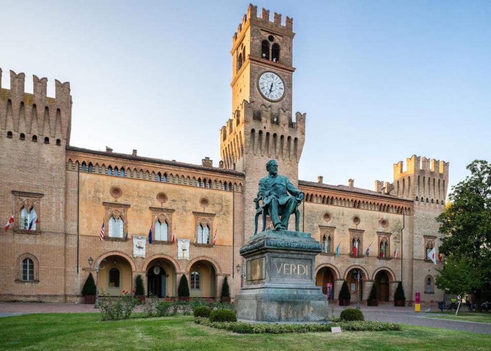 <div class="inline-image__caption"><p>Verdi Monument in front of Rocca Pallavicino with Opera House Teatro in Busseto.</p></div> <div class="inline-image__credit">Getty Images</div>