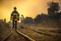 <p>The fire that burned 500 to 600 hectares of forest near Artigues in the Var, threatened homes on Tuesday. The firefighters stopped the progression of the fire that threatened homes in Seillons Source d’Argens, July 25, 2017. (Lilian Auffret/SIPA/REX/Shutterstock) </p>