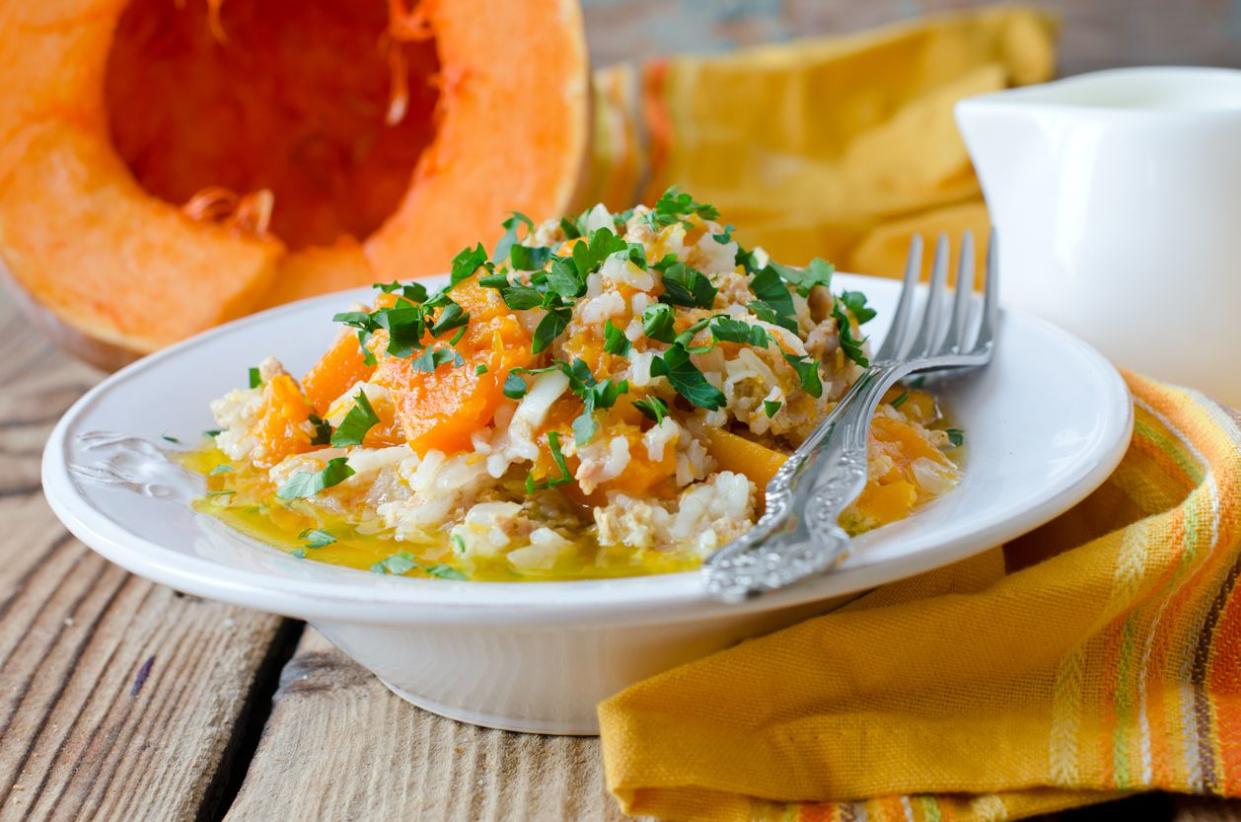 Bowl of Pumpkin stew with rice and meat