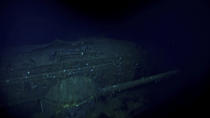 In this Oct. 7, 2019 image taken from underwater video provided by Vulcan Inc., the Japanese aircraft carrier Kaga is shown in the Pacific Ocean off Midway Atoll in the Northwestern Hawaiian Islands. Deep-sea explorers scouring the world's oceans for sunken World War II ships are honing in on a debris field deep in the Pacific. A research vessel called the Petrel is launching underwater robots about halfway between the U.S. and Japan in search of warships from the Battle of Midway. Weeks of grid searches around the Northwestern Hawaiian Islands already have led the Petrel to one sunken battleship, the Kaga. (Vulcan Inc. via AP)