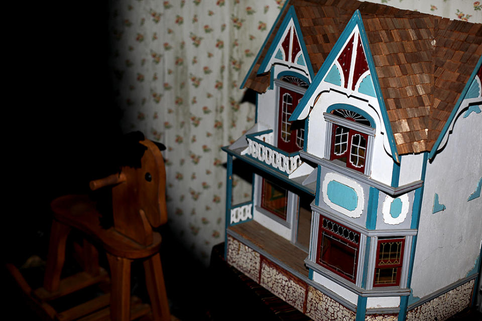 <p>Stay alert. You never know what may be lurking among the shadows behind the seemingly innocent dollhouse and rocking horse within Parker’s bedroom. (Photo: Camilo Urdaneta/Yahoo) </p>