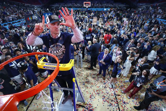 <p>Jamie Schwaberow/NCAA Photos via Getty Images</p> Dan Hurley celebrates UConn win