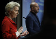 European Commission President Ursula von der Leyen, left, and European Council President Charles Michel participate in a media conference after an EU summit in video conference format at the European Council building in Brussels, Thursday, Oct. 29, 2020. EU leaders held a video conference to address the need to strengthen the collective effort to fight the COVID-19 pandemic. They also discussed quarantine regulations, cross-border contact tracing, and temporary restrictions on non-essential travel into the EU as well as the EU vaccine strategy. (Olivier Hoslet, Pool via AP)