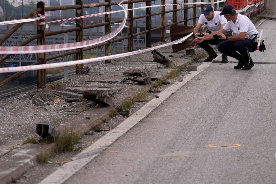 PHOTO: Local Police officers check the scene of a passenger bus accident in Mestre, near the city of Venice, Italy, Oct. 4, 2023. The bus fell from an elevated road late Tuesday. (Antonio Calanni/AP)