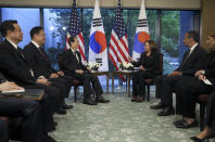 U.S. Vice President Kamala Harris, center right, holds a bilateral meeting with South Korea's Prime Minister Han Duck-soo, center, left, in Tokyo, Tuesday, Sept. 27, 2022. (Leah Millis/Pool Photo via AP)