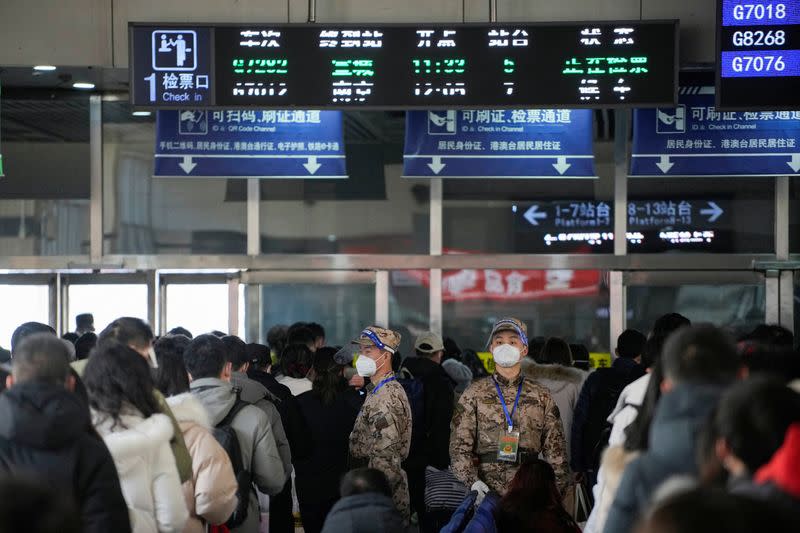 People travel during annual Spring Festival travel rush, ahead of the Chinese Lunar New Year, in Shanghai