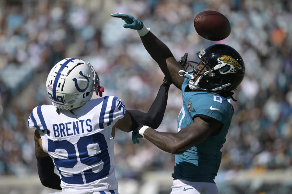 Indianapolis Colts cornerback JuJu Brents (29) breaks up a pass intended for Jacksonville Jaguars wide receiver Calvin Ridley (0) during the second half of an NFL football game, Sunday, Oct. 15, 2023, in Jacksonville, Fla. (AP Photo/Phelan M. Ebenhack)