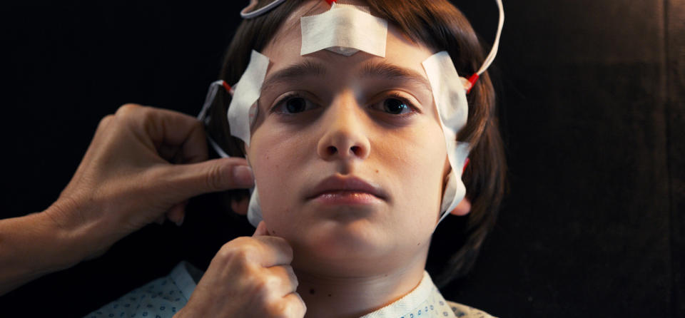 close up of Will with machine wires on his head and face