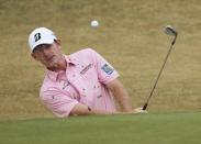 Brandt Snedeker of the U.S. hits out of a sand trap on the fourth hole during the first round if the U.S. Open Championship golf tournament in Pinehurst, North Carolina June 12, 2014. REUTERS/Robert Galbraith
