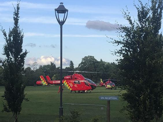 Air ambulances at the scene in Forbury Gardens, Reading. (AP)