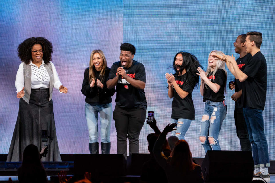 <div class="inline-image__caption"><p>Oprah Winfrey speaks with the stars of Netflix's <em>Cheer</em> (L-R) Monica Aldama, Jerry Harris, Gaby Butter, Lexi Brumback, TT Baker and Dillion Brandt during Oprah's 2020 Vision: Your Life in Focus Tour presented by WW at American Airlines Center on February 15, 2020, in Dallas, Texas.</p></div> <div class="inline-image__credit">Suzanne Cordeiro/AFP/Getty</div>