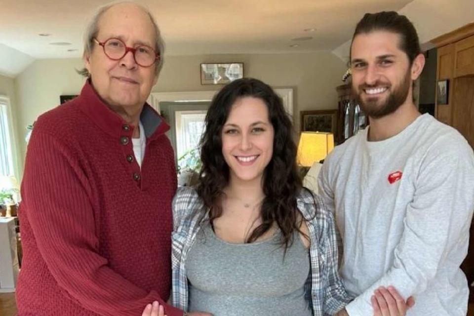 <p>Chevy Chase/Instagram</p> Chevy Chase poses with his daughter Emily Chase and her partner Alex Baglieri