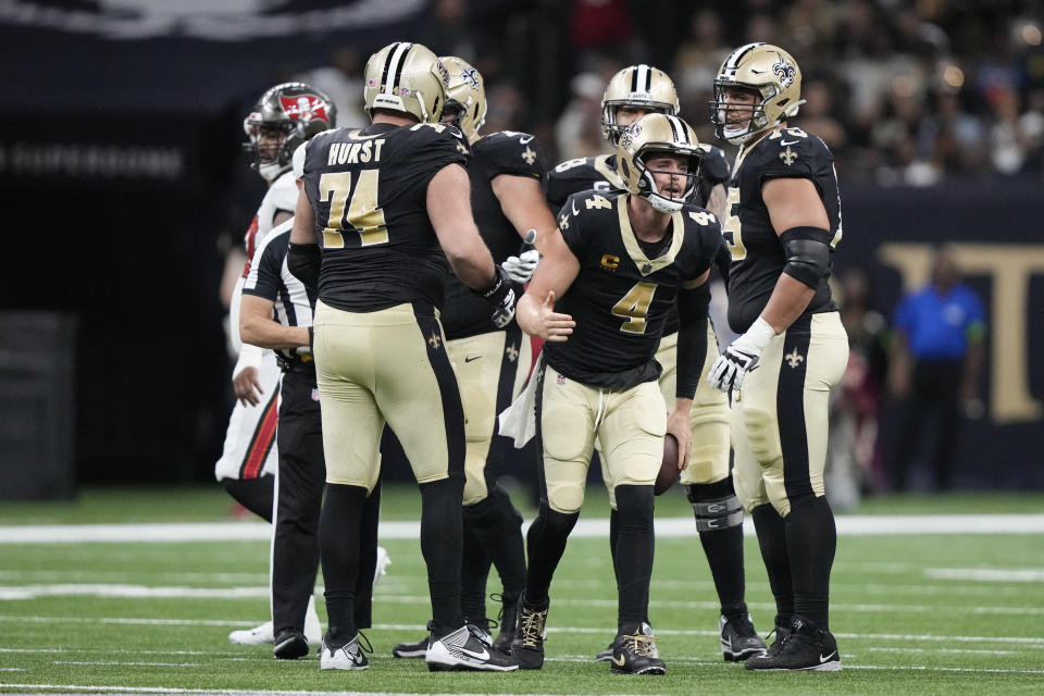 New Orleans Saints quarterback Derek Carr reacts after being sacked in the first half of an NFL football game against the Tampa Bay Buccaneers in New Orleans, Sunday, Oct. 1, 2023. (AP Photo/Gerald Herbert)