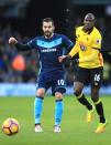 <p>Alvaro Negredo of Middlesbrough (L) and Abdoulaye Doucoure of Watford (R) watch the ball</p>