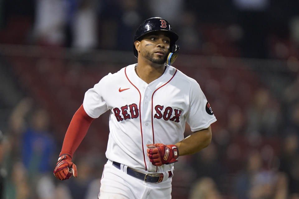 Boston Red Sox's Xander Bogaerts runs the bases after hitting a two-run home in the eighth inning of a baseball game against the Houston Astros, Monday, May 16, 2022, in Boston. The Red Sox won 6-3. (AP Photo/Steven Senne)