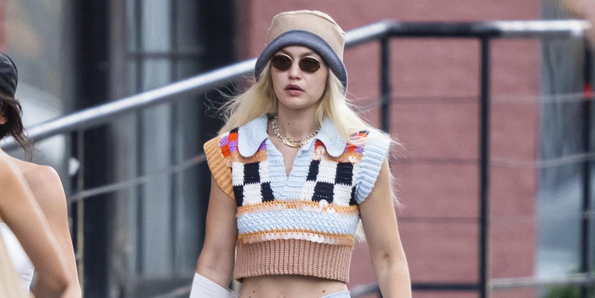 Gigi Hadid Wears Preppy Skater Girl Outfit in a Quirky Sweater Vest