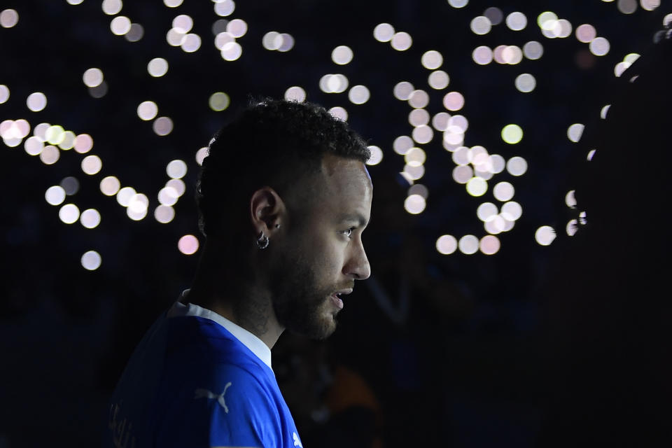 Brazilian national team's historical top scorer and the star of Paris Saint-Germain, Neymar Jr. attends the official unveiling as a new member of Saudi Al Hilal club at King Fahd Stadium in Riyadh, Saudi Arabia, Saturday, Aug. 19, 2023. Al Hilal club reached an agreement on the transfer of the Brazil forward for a reported 90 million euros ($98 million), a record for a league that is now financially backed by the oil-rich state. (AP Photo)