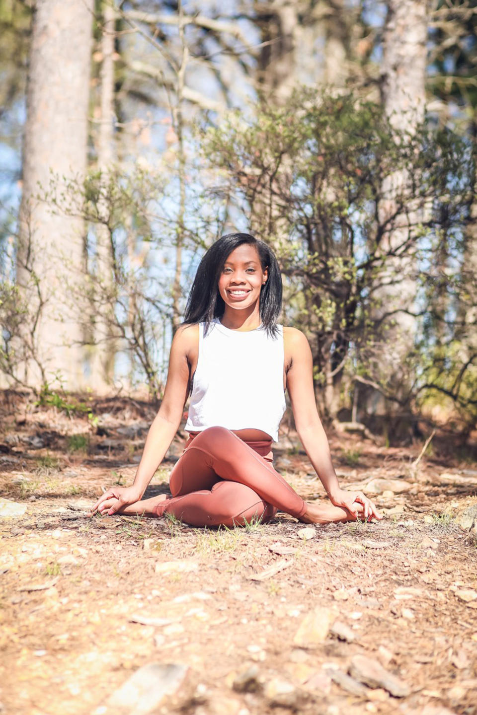 This undated photo provided by Ebony L. Blevins in July 2021 shows Sarah Thomas Pilcher of Little Rock, Ark. Pilcher has started raising money for St. Jude Children’s Research Hospital by teaching yoga classes online. (Ebony L. Blevins via AP)