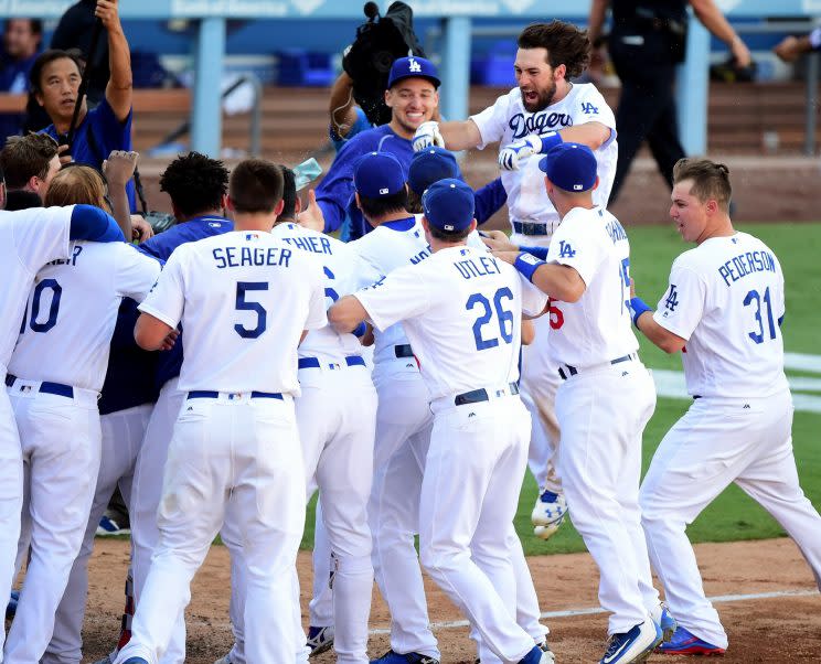 The Dodgers overcame a record number of injuries to win the NL West. (Getty Images/Harry How)