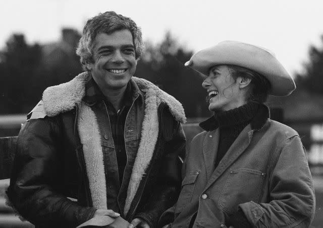 <p>Susan Wood/Getty</p> American fashion designer Ralph Lauren smiles outdoors with his wife Ricky