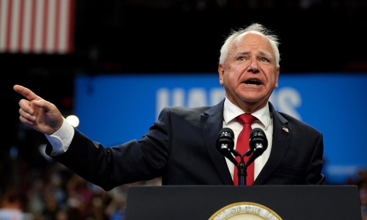 <span>Tim Walz at a campaign rally on Saturday in Las Vegas.</span><span>Photograph: Julia Nikhinson/AP</span>