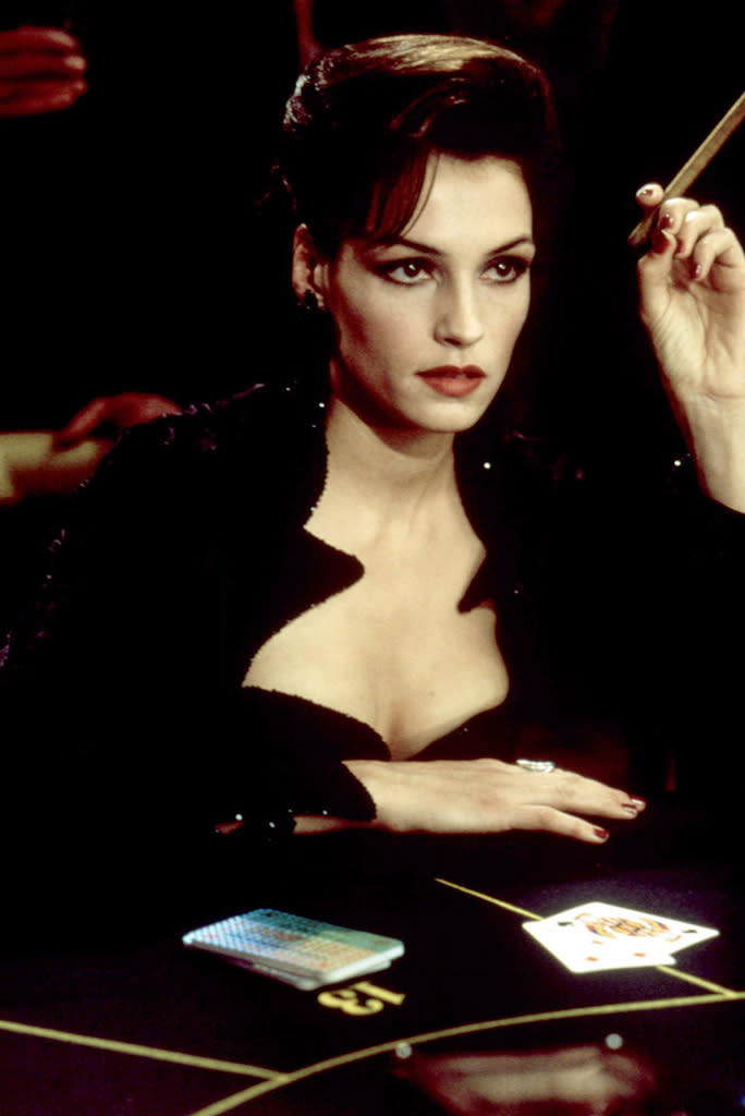 XENIA ONATOPP <br> MOVIE: <a href="http://movies.yahoo.com/movie/1800249529/info" data-ylk="slk:GoldenEye;elm:context_link;itc:0;sec:content-canvas" class="link ">GoldenEye</a> <br>ACTRESS: <a href="http://movies.yahoo.com/movie/contributor/1800021195" data-ylk="slk:Famke Janssen;elm:context_link;itc:0;sec:content-canvas" class="link ">Famke Janssen</a> <br>ALLEGIANCE: Soviet Military/Janus Syndicate <br>LAST SEEN: Getting crushed to death by an ugly combination of a safety harness, a tree, and a plunging helicopter. <br>SPECIAL SKILLS: Russian fighter pilot, skilled baccarat player, really enjoys killing men with her thighs.