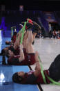 In this photo provided by Bahamas Visual Services, South Carolina players warmup before an NCAA college basketball game against South Carolina at Paradise Island, Bahamas, Monday, Nov. 22, 2021. (Tim Aylen/Bahamas Visual Services via AP)