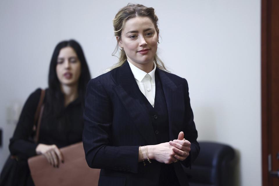 Actor Amber Heard arrives in the courtroom at the Fairfax County Circuit Court in Fairfax, Va., . Actor Johnny Depp sued his ex-wife Amber Heard for libel in Fairfax County Circuit Court after she wrote an op-ed piece in The Washington Post in 2018 referring to herself as a "public figure representing domestic abuse