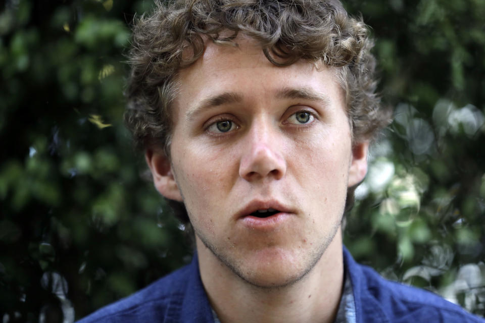 University of California student Tyler Heintz answers questions during an interview on the university's campus Wednesday, June 6, 2018, in, Berkeley, Calif. Heintz and other fellow students who were in Nice, France when a terrorist drove a truck down a promenade killing 83 people, including one of their classmates, have channeled their grief and anger into two nonprofits to fight terrorism. (AP Photo/Marcio Jose Sanchez)