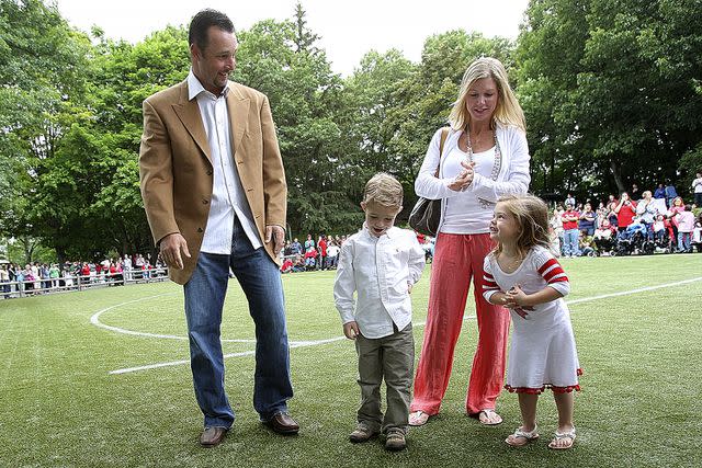 <p>Suzanne Kreiter/The Boston Globe via Getty</p> Franciscan Hospital for Children dedicated its new athletic field to Red Sox Pitcher Tim Wakefield. He and his wife, Stacy, and kids Trevor and Brianna, dedicate the new field.