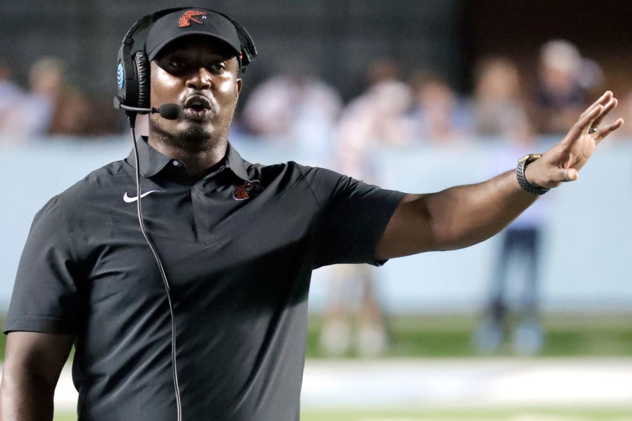 Florida A&M head coach Willie Simmons directs the team against North Carolina during the first half of an NCAA college football game in Chapel Hill, N.C., Saturday, Aug. 27, 2022. (AP Photo/Chris Seward)