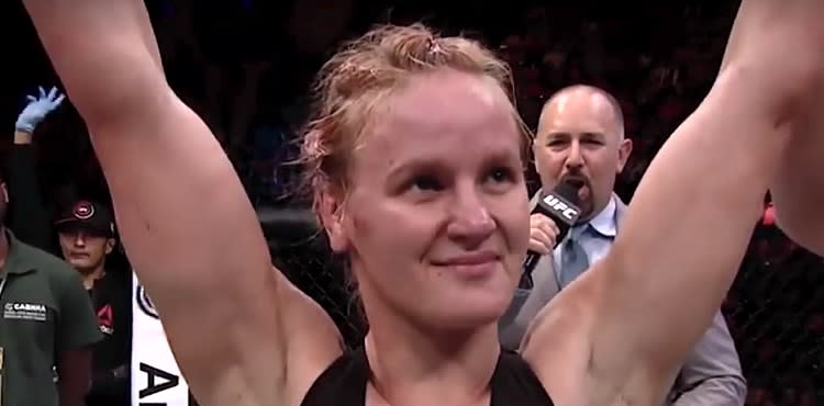 Valentina Shevchenko - arms raised in victory