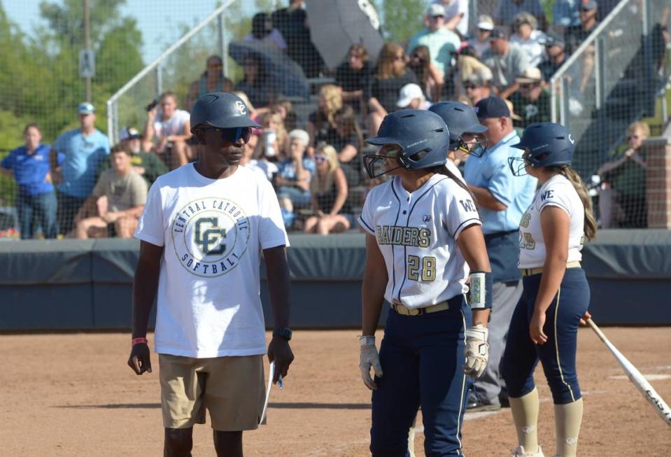 Central Catholic coach Sam Nichols and shortstop Taryn Calderon talk during a timeout in the Sac-Joaquin Section Division III championship against Ponderosa at Cosumnes River College on Saturday, May 27. Central Catholic lost 1-0.