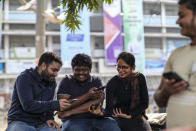 A group of youth interact at the Dhaka University area, Bangladesh, Dec. 21, 2023. For decades, political battles in Bangladesh have been fought on the streets, often with violence, by parties led by two powerful women. But there are signs of a generational change as the country of 169 million heads into another general election Sunday. (AP Photo/Mahmud Hossain Opu)