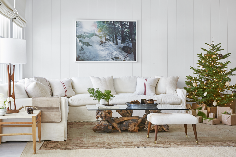 a cozy living room in lake tahoe with a white sofa