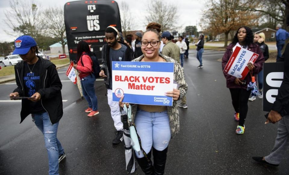 Fayetteville State University students get off a Black Votes Matter bus at Smith Recreation Center on March 3, 2020 in Fayetteville, North Carolina. (Photo by Melissa Sue Gerrits/Getty Images)