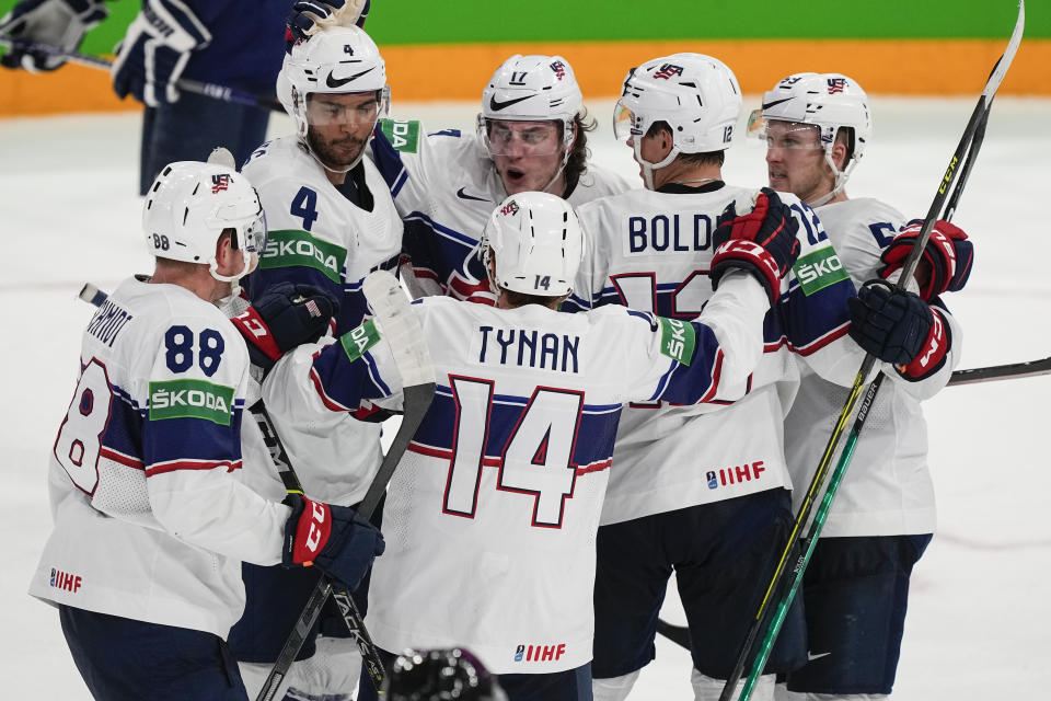 Team United States celebrates a goal by Adam Gaudette during a match between Finland and the the United States in the semifinals of the Hockey World Championships, in Tampere, Finland, Saturday, May 28, 2022. (AP Photo/Martin Meissner)