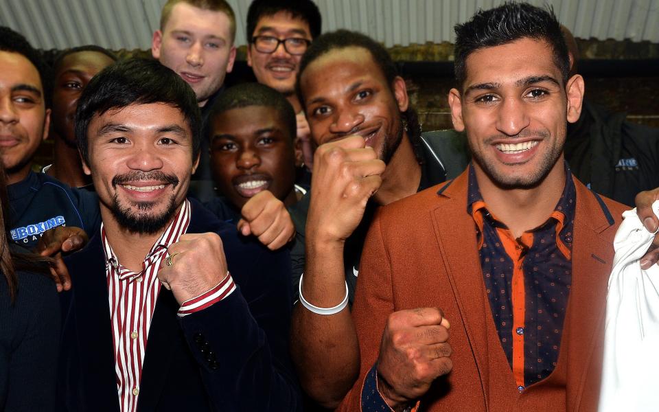 Manny Pacquiao and Amir Khan - Credit: PA