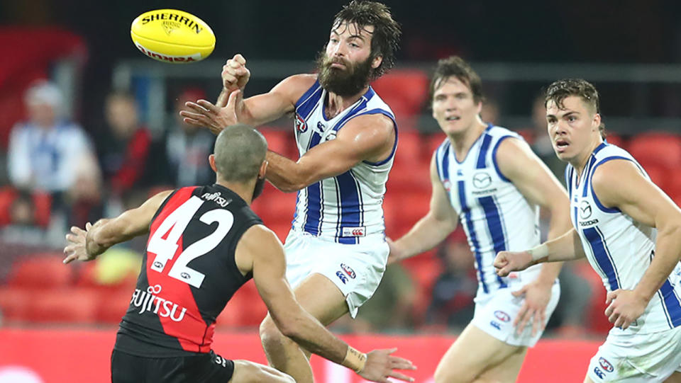 Luke McDonald, pictured here in action for North Melbourne against Essendon. 