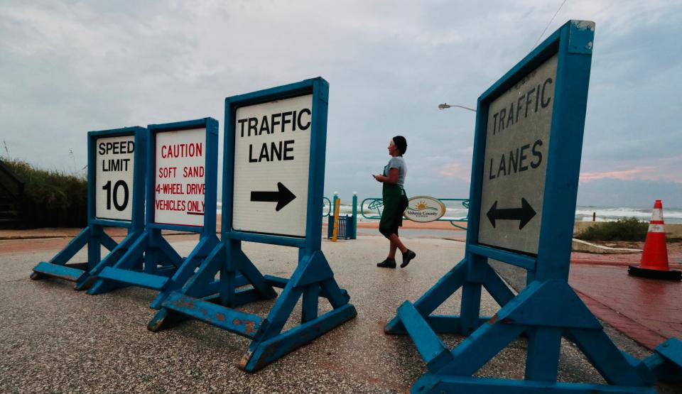 The sun rises at the Granada Boulevard beach ramp in Ormond Beach on Wednesday, Aug. 30, 2023. Hurricane Idalia churned up surf along Volusia and Flagler beaches as it made landfall in the Big Bend area of Florida.